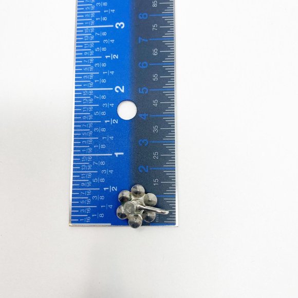452 Three vintage Coro screw-back earrings